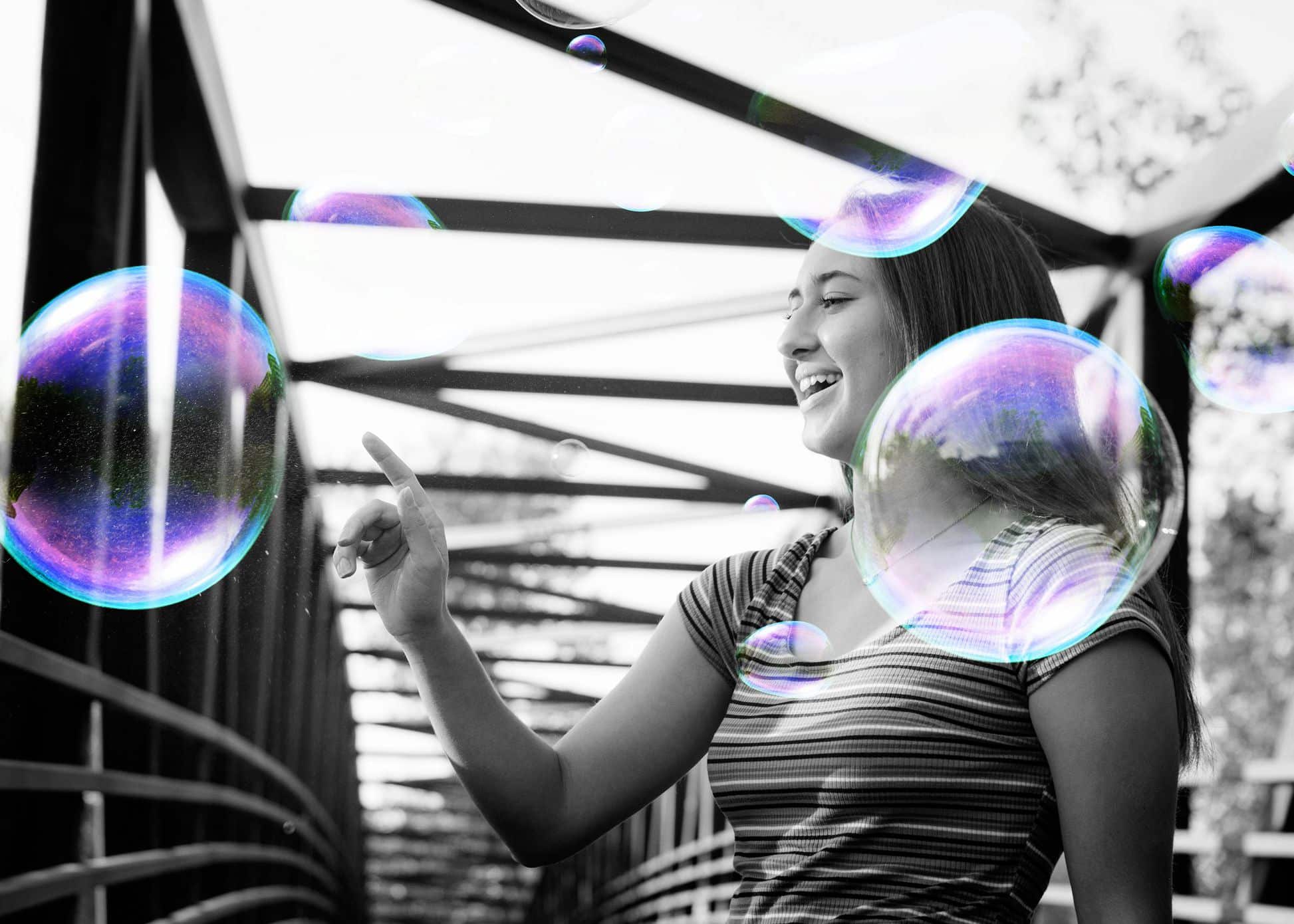 Woman popping bubbles